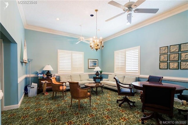 living area featuring plenty of natural light, carpet flooring, crown molding, and ceiling fan with notable chandelier