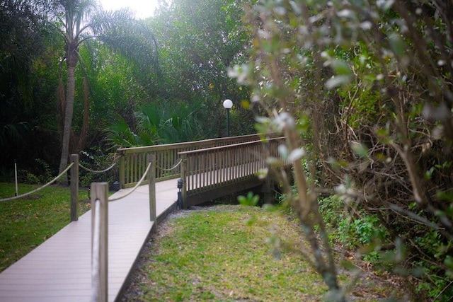 view of property's community featuring a wooden deck