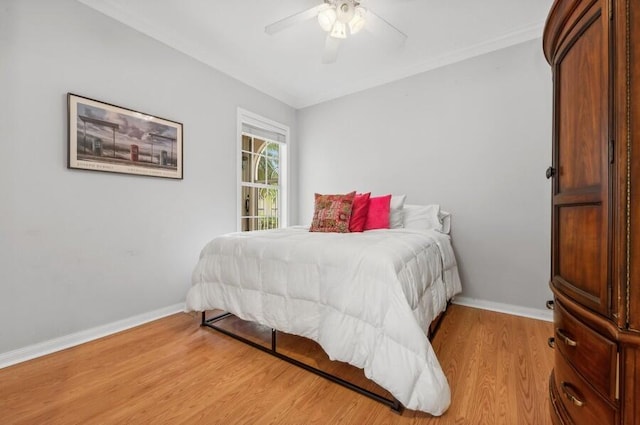 bedroom featuring light hardwood / wood-style flooring and ceiling fan