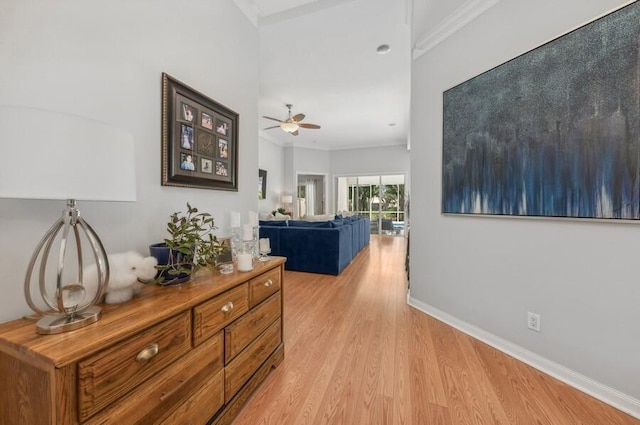 hall with light wood-type flooring