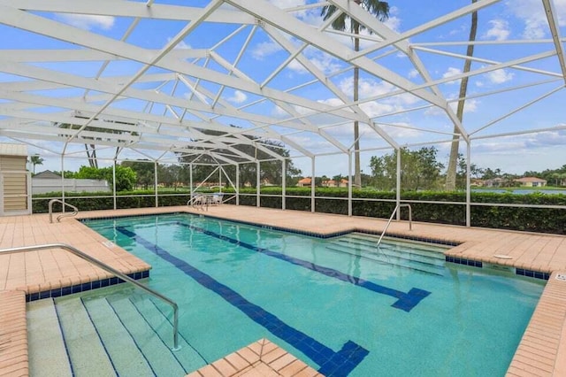 view of pool featuring a lanai