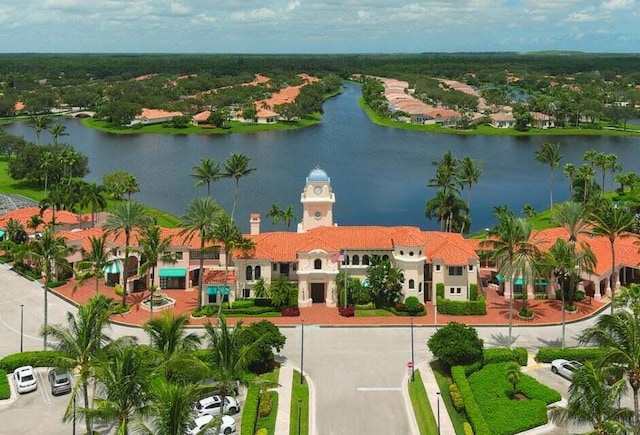 birds eye view of property with a water view