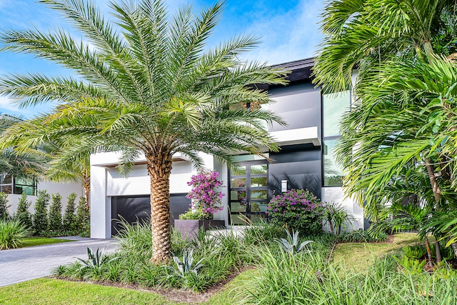 view of front of property with a garage