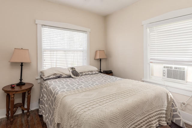 bedroom featuring dark hardwood / wood-style floors