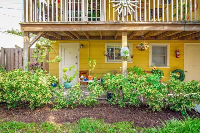 property entrance with a balcony