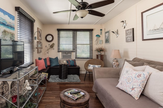 living room featuring ceiling fan and dark wood-type flooring