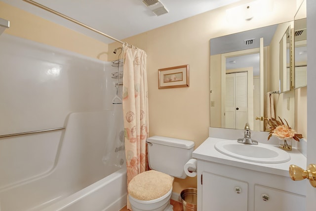 full bathroom featuring vanity, shower / bathtub combination with curtain, and toilet