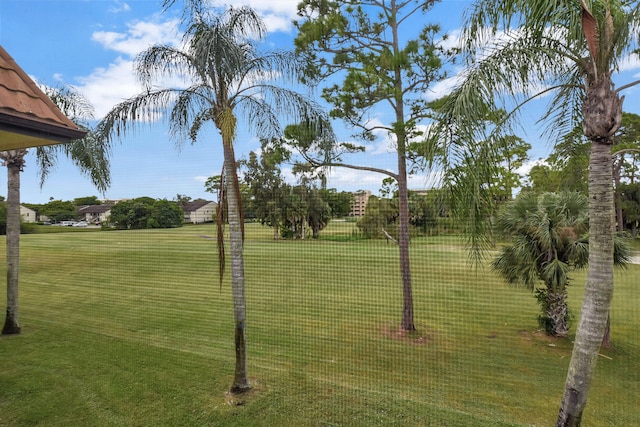 surrounding community featuring a lawn