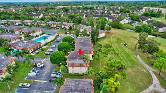 aerial overview of property's location featuring a pool area