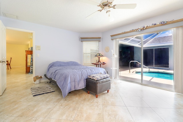 tiled bedroom featuring ceiling fan, access to exterior, and multiple windows