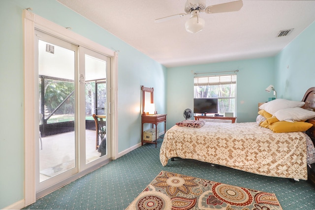 bedroom with ceiling fan, dark colored carpet, and access to exterior