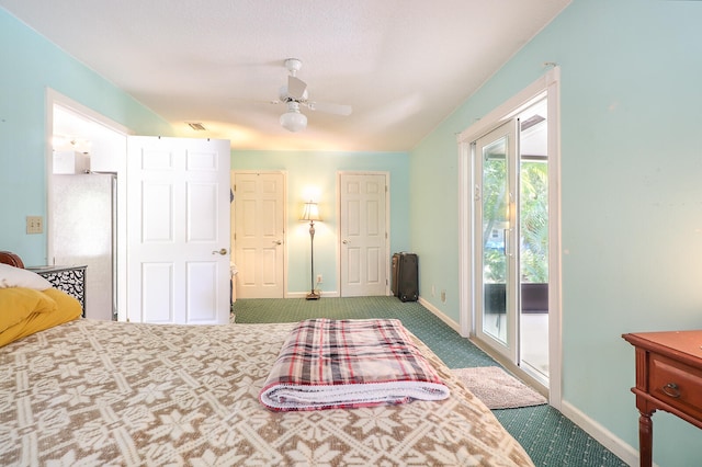 bedroom with ceiling fan, access to exterior, carpet floors, and stainless steel refrigerator