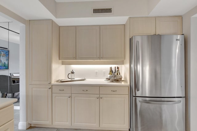 kitchen featuring stainless steel refrigerator