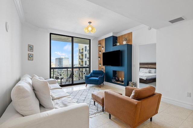 tiled living room featuring crown molding, a textured ceiling, and a wall of windows