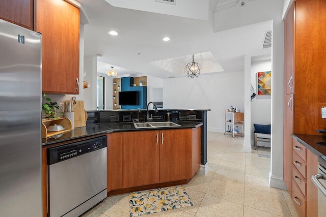 kitchen with dark stone countertops, appliances with stainless steel finishes, sink, and light tile floors