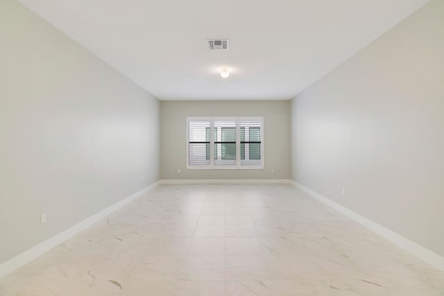 view of tiled spare room