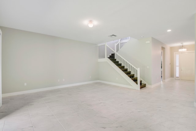 spare room with light tile flooring