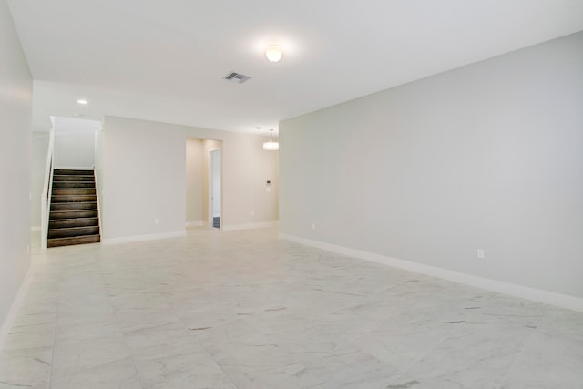 spare room with light tile flooring