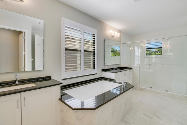 bathroom with dual bowl vanity, tile flooring, and independent shower and bath