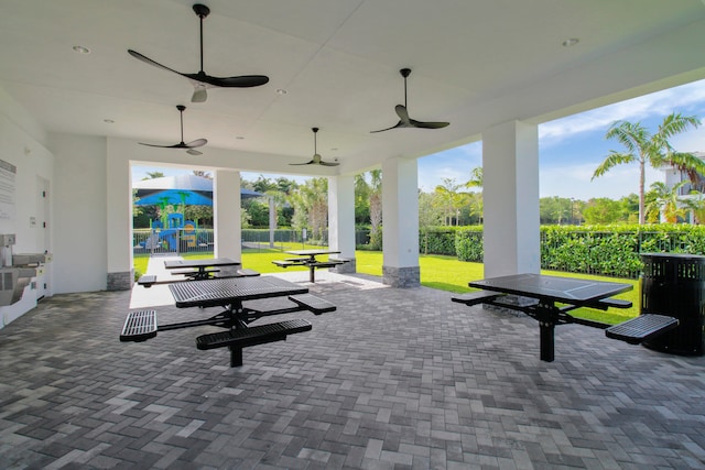 view of patio featuring ceiling fan