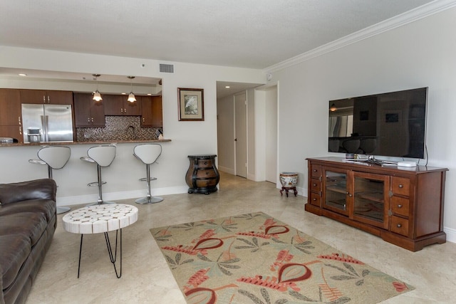 living room featuring ornamental molding