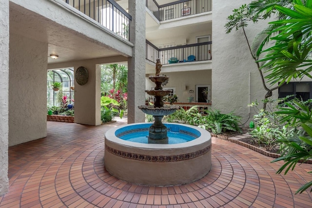 view of patio with a balcony