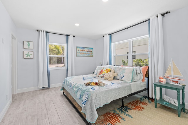 bedroom featuring light hardwood / wood-style flooring