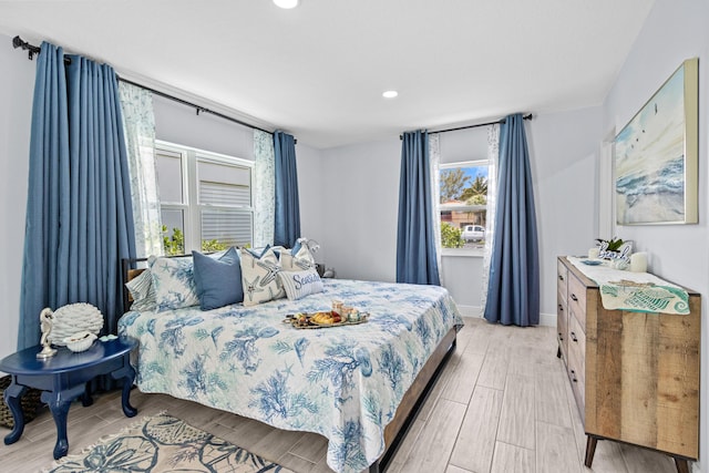 bedroom with light hardwood / wood-style floors