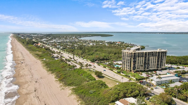 aerial view with a view of the beach and a water view