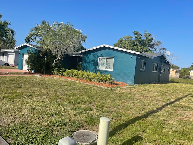 view of front of home with a front lawn