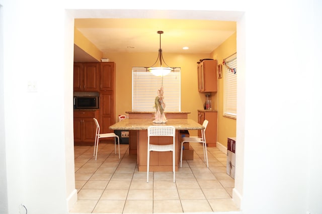 view of tiled dining space