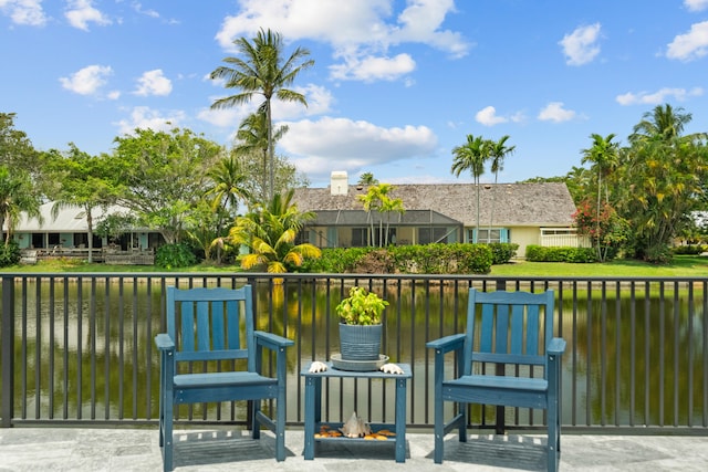 view of gate with a water view