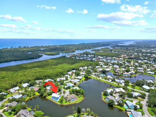 bird's eye view with a water view