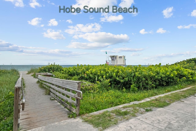 9029 SE Breeze Way, Hobe Sound, FL 33455 - view of property's community with a water view