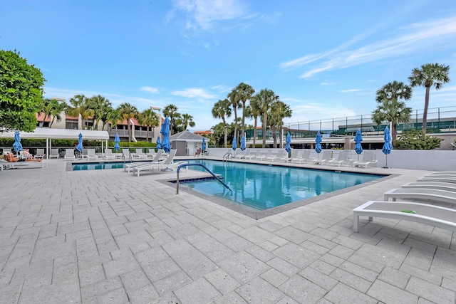 view of swimming pool featuring a patio area