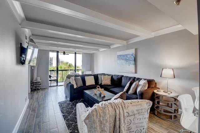 living room with hardwood / wood-style floors, beam ceiling, and crown molding