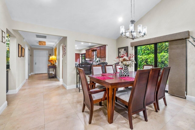 dining space with an inviting chandelier and light tile floors