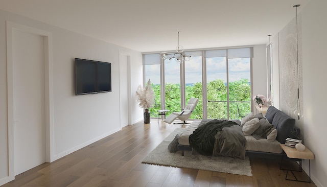 bedroom featuring floor to ceiling windows, a notable chandelier, and dark wood-type flooring