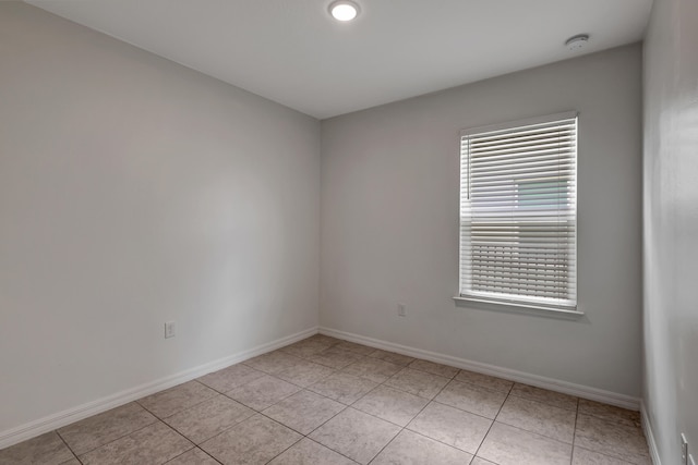 view of tiled spare room