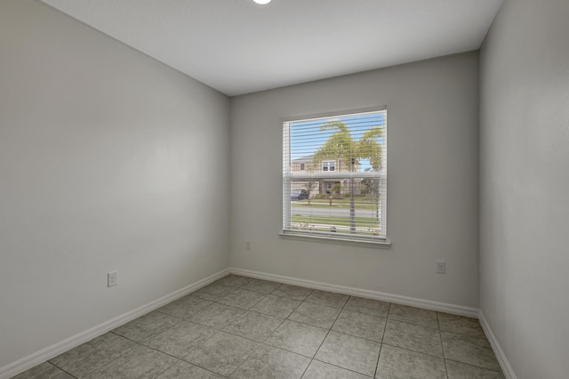 view of tiled empty room