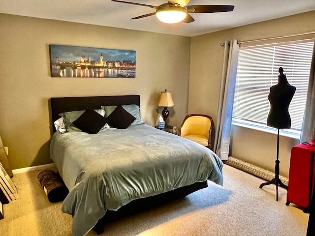 bedroom featuring ceiling fan and carpet floors