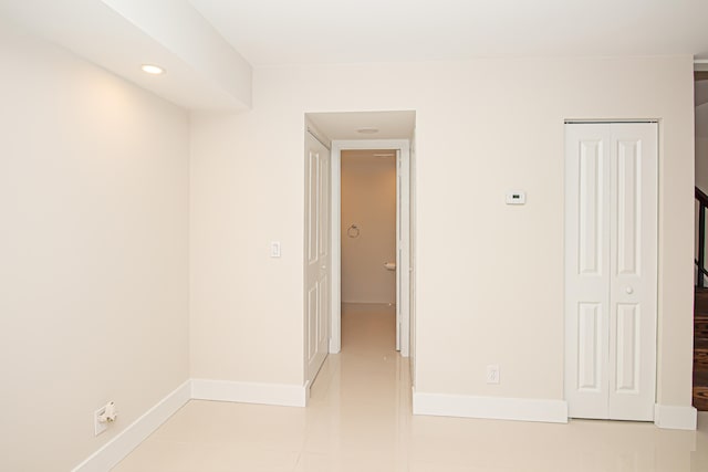 empty room with tile flooring