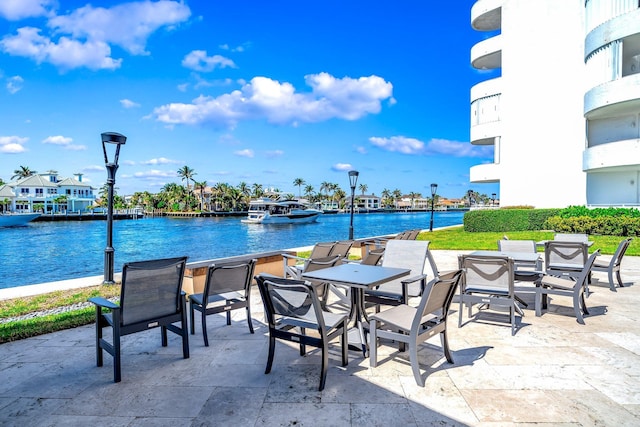 view of patio / terrace with a water view