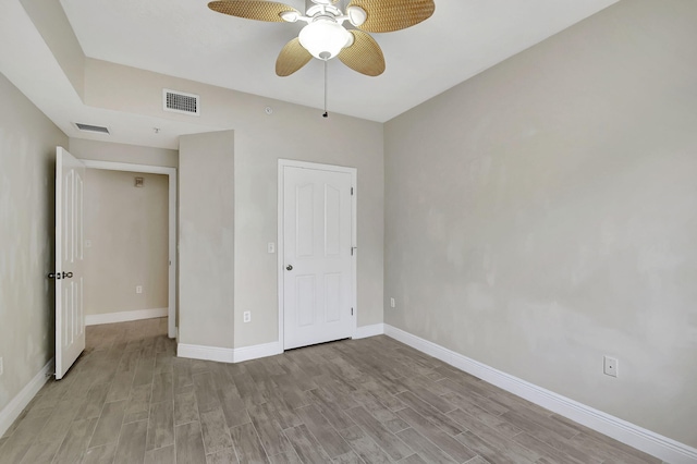 bathroom with toilet, vanity, walk in shower, tile patterned floors, and a textured ceiling