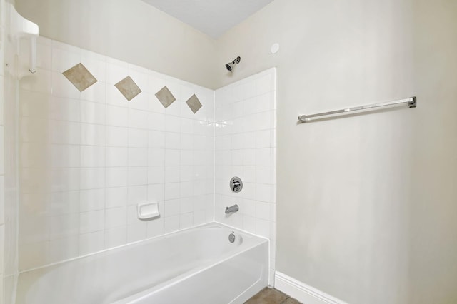 empty room featuring ceiling fan, a wealth of natural light, and light hardwood / wood-style floors