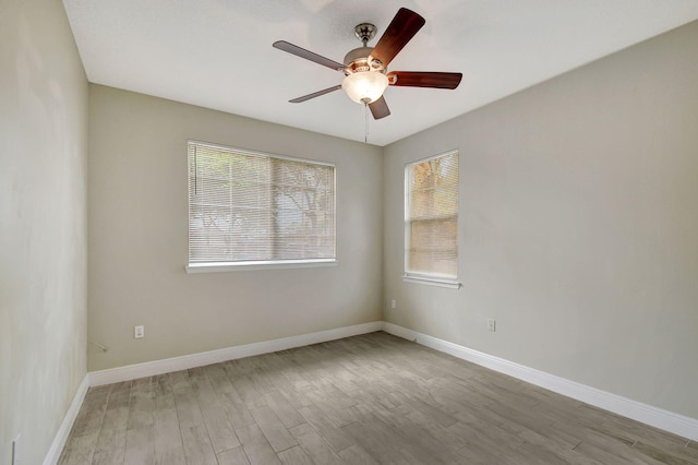 unfurnished bedroom with ceiling fan and light hardwood / wood-style floors