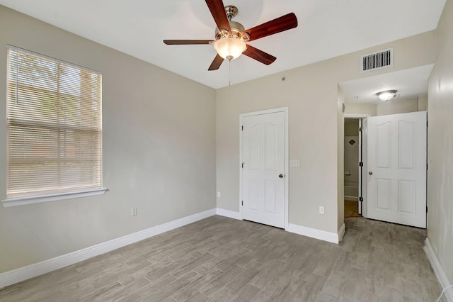 full bathroom featuring toilet, tiled shower / bath, tile patterned flooring, a textured ceiling, and vanity