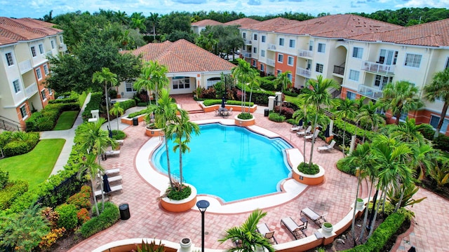 view of swimming pool featuring a patio area