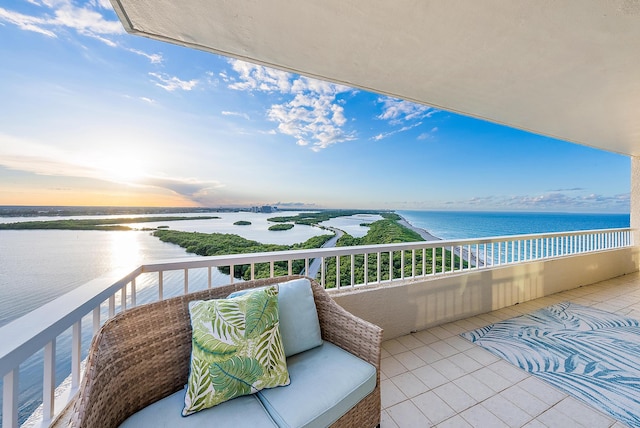 balcony at dusk with a water view