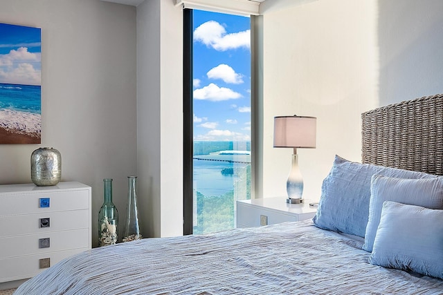 bedroom with a water view